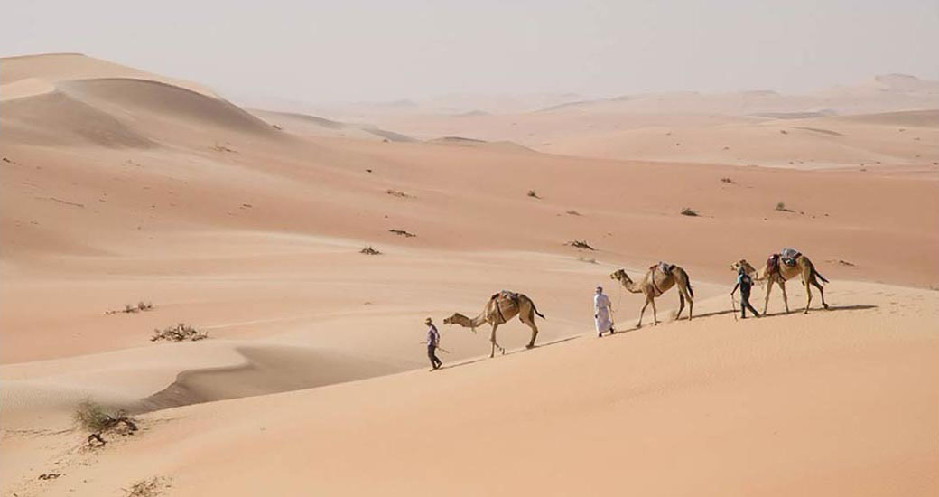 /2010-14-Two-Omanis-an-Englishman-and-three-camels.jpg